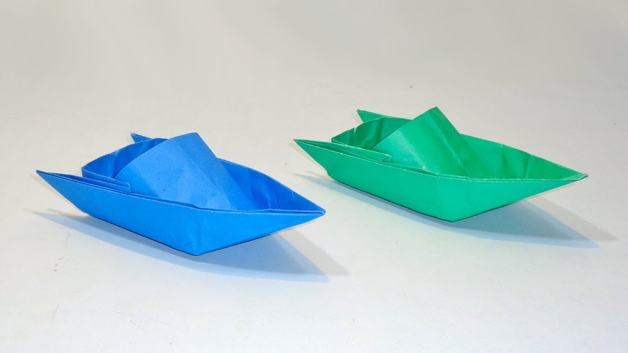 Кораблик из бумаги легко. Бумажный кораблик оригами. Оригами кораблик лодочка. Оригами кораблик парусник. Кораблик оригами катер.