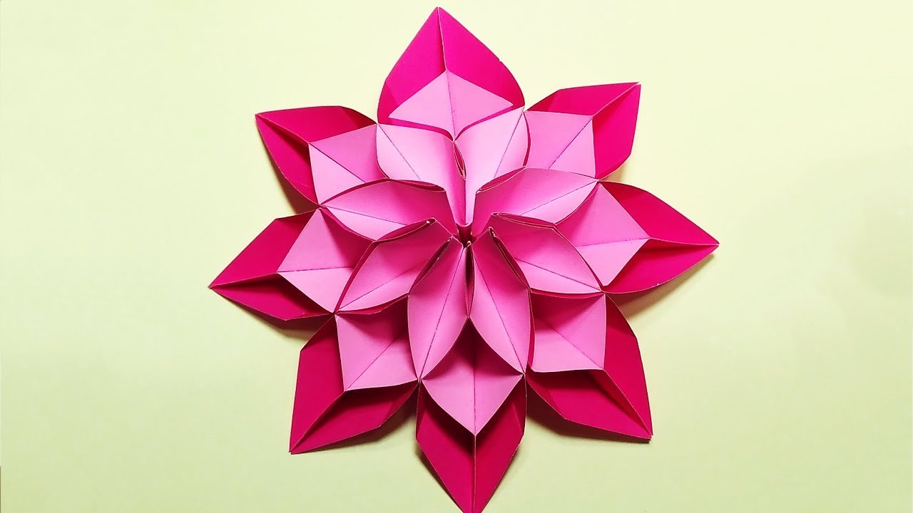Оригами цветок памяти. Оригами. Оригами цветочек. Цветы оригами плоские. Цветок из бумажных квадратиков.