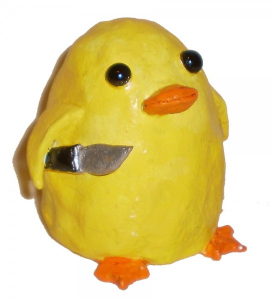 Утенок с ножом игрушка
