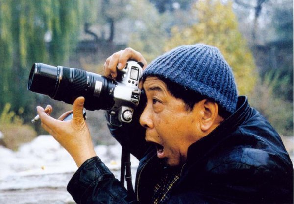 Старик с фотоаппаратом