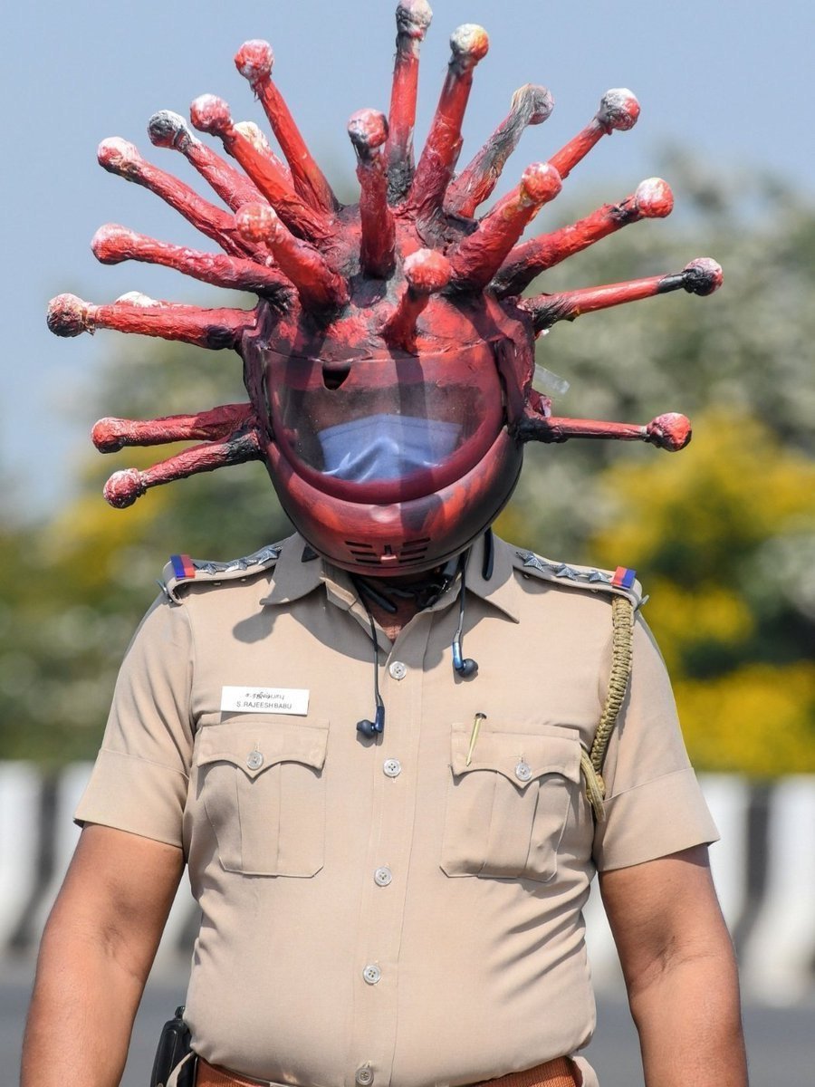 Индия полиция шлем коронавирус