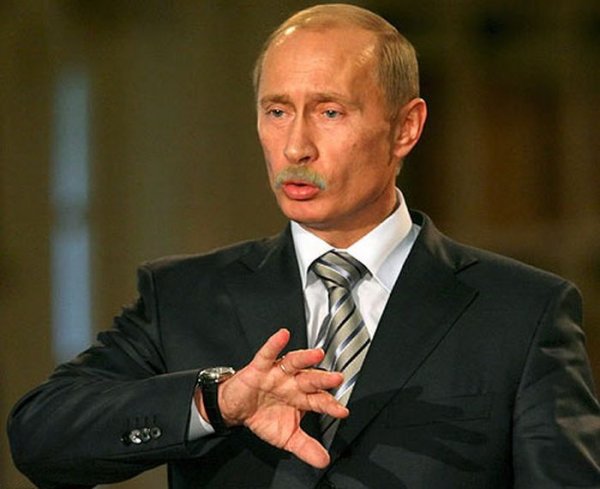Счастливое лицо Путина