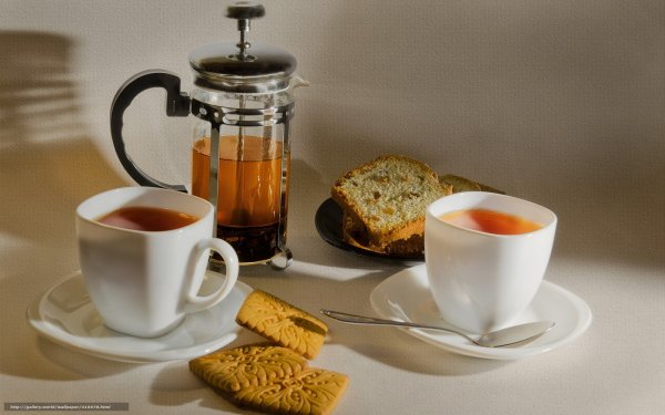 Две чашки чая с печеньем