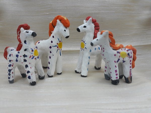 Дымковские игрушки из глины собака
