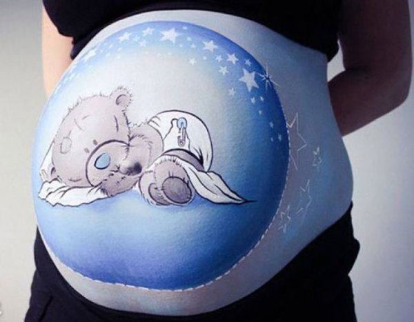 Рисование на животе беременных