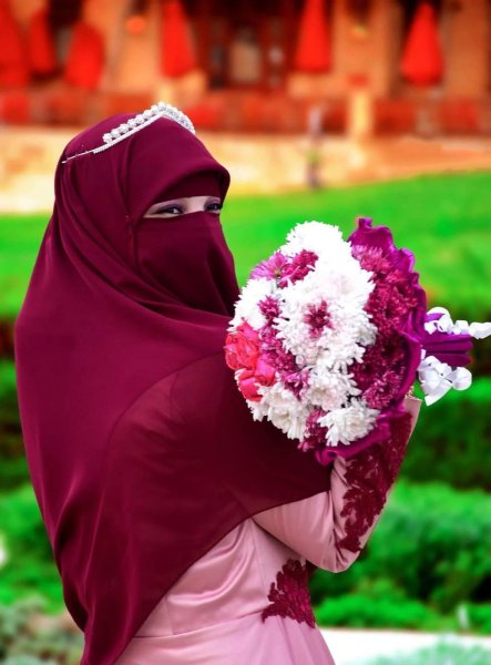 Мусульманка и Коран