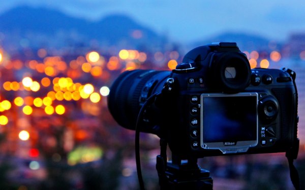 Фотоаппарат фотографирует