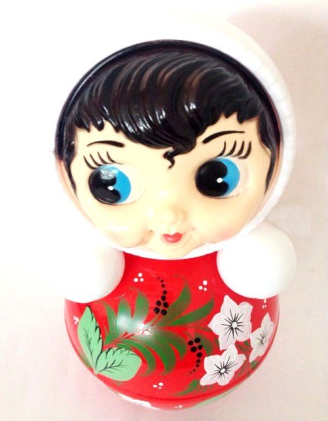 Неваляшка деревянная