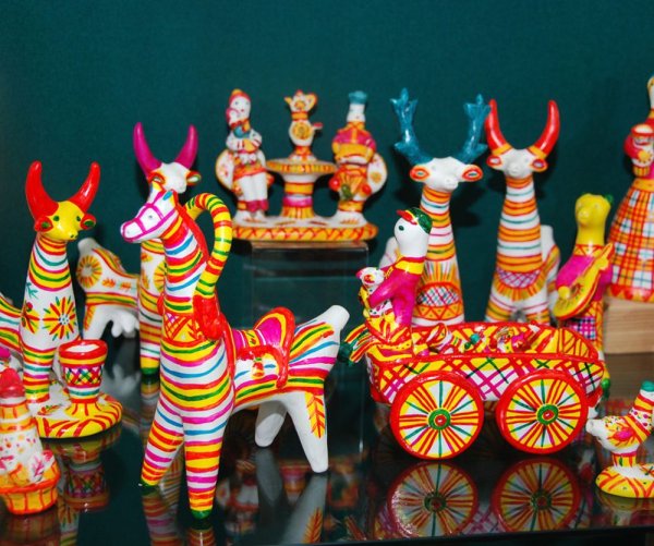 Филимоновская игрушка петушок